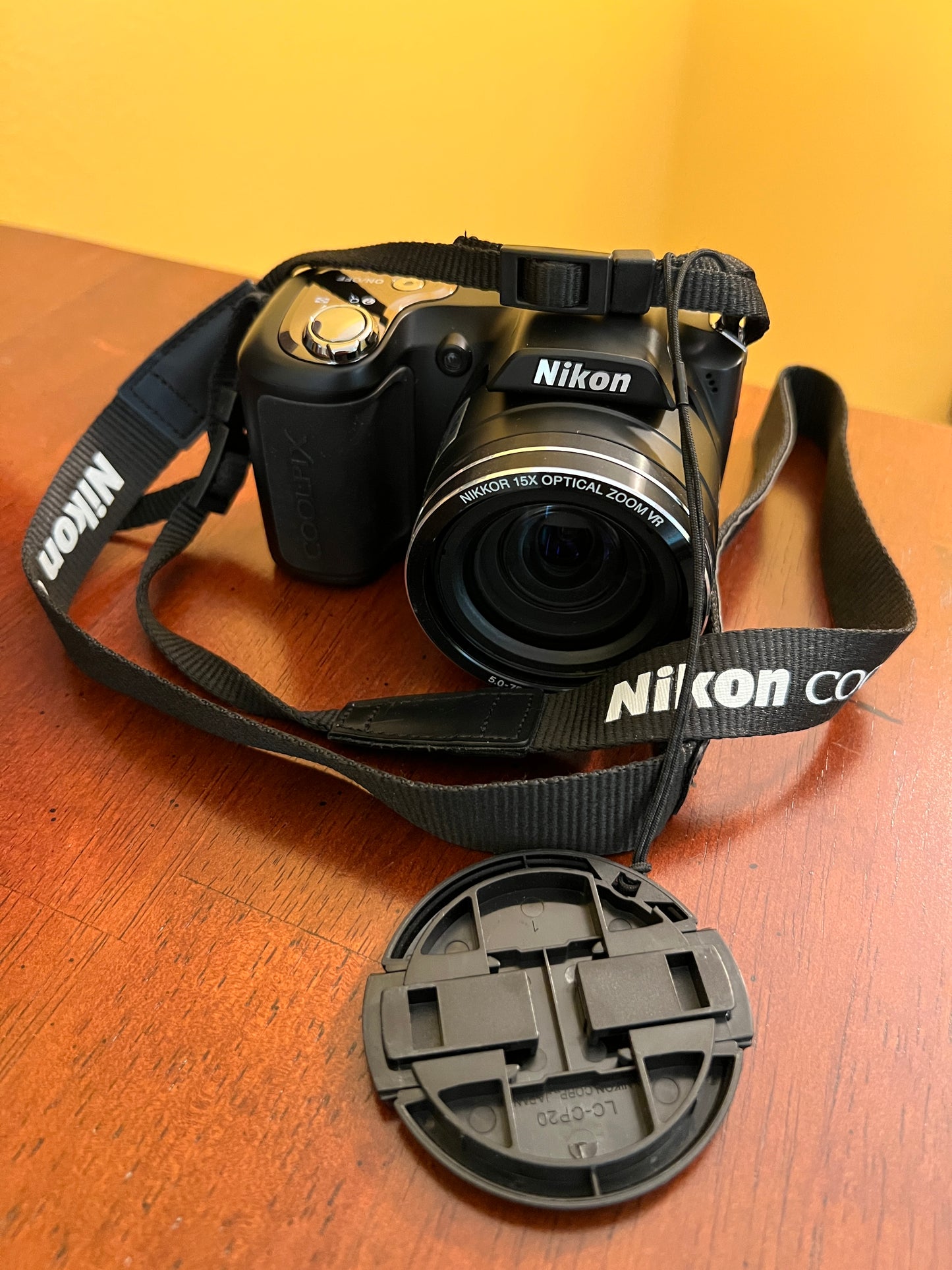 Nikon Coolpix L100 10MP Digital Camera with 15x Optical VR Zoom + Lowepro Case & Accessories